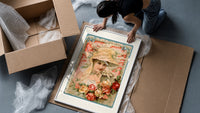 Victorian woman in bonnet with flowers framed print being unpacked from protective bubble wrap and a box