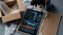 Lamborghini Huracan STO framed print being unboxed from protective packaging