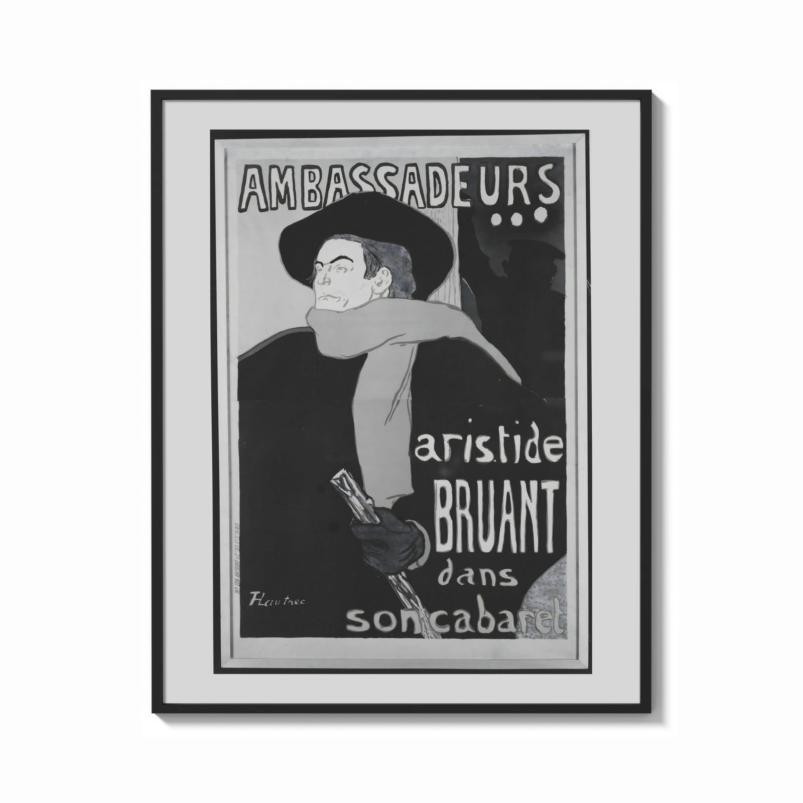 Framed Man in hat and scarf print shown as a bold statement piece on a clean gallery wall