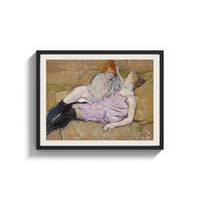 Framed Two reclining women on sofa print shown as a wide statement piece on a clean white wall