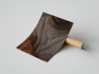 Gently curled Layered Gold Chains on Taupe print beside its protective shipping tube