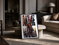 Anime hero collage in giant letters print in a black frame leaning on a travertine table in a sunlit lounge