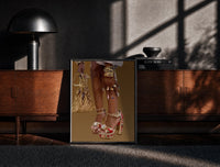 Black-framed Legs in Jeweled Platform Heels print on the floor in front of a dark wooden console