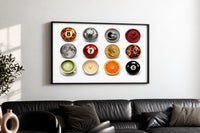 Leopard 8 Ball Circle Collage print in a black frame above a black leather sofa on a white wall