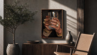 Leopard Nails and Gold Rings poster framed above a fluted sideboard beside a potted tree