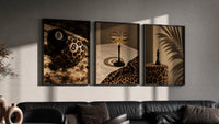 Leopard Print Still Life Set of 3 in black frames on a grey wall above a leather sofa
