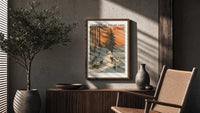 Winter sports scene with sledders and skiers poster framed above a fluted sideboard beside an olive tree
