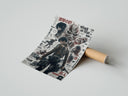 Rolled Attack on Titan characters and titans poster beside its crush-resistant kraft shipping tube
