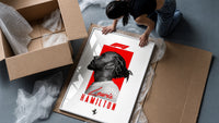 Lewis Hamilton profile portrait framed print being unpacked from protective bubble wrap and a box