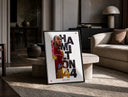 Lewis Hamilton F1 driver portrait print in a black frame leaning on a travertine table in a sunlit lounge