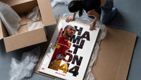 Lewis Hamilton F1 driver portrait framed print being unpacked from protective bubble wrap and a box