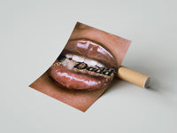Gently curled Lips Holding a Daddy Chain print beside its protective shipping tube