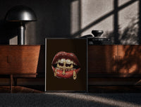 Black-framed Lips with a Cross and Grillz print on the floor in front of a dark wooden console