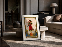 Girl witch holding black cat print in a black frame leaning on a travertine table in a sunlit lounge
