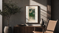 White hellebore flowers with sparrows poster framed above a fluted sideboard beside an olive tree