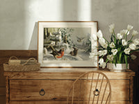 Robin, wrens and tit in snow print in an oak frame on a farmhouse dresser beside white tulips