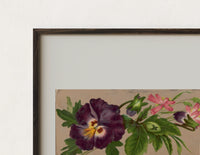 Close-up of the Purple pansy and pink blossom bouquet print's dark wood frame corner and archival matte paper