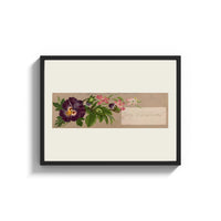 Framed Purple pansy and pink blossom bouquet print shown as a wide statement piece on a clean white wall