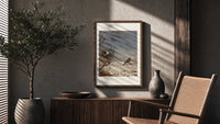 American robin perched on branch poster framed above a fluted sideboard beside an olive tree
