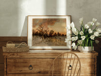 Winter landscape with ice skaters at dusk print in an oak frame on a farmhouse dresser beside white tulips