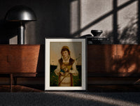 Black-framed Young woman holding roses and book print on a moody console with designer coffee-table books