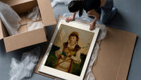 Young woman holding roses and book framed print being unpacked from protective bubble wrap and a box