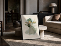 Blonde girl in plumed hat holding violets print in a black frame leaning on a travertine table in a sunlit lounge