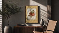 Autumn-tinted leaves branch poster framed above a fluted sideboard beside an olive tree