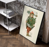 Girl carrying holly branches in apron poster in a black frame leaning beside a shelf in a raw-plaster loft