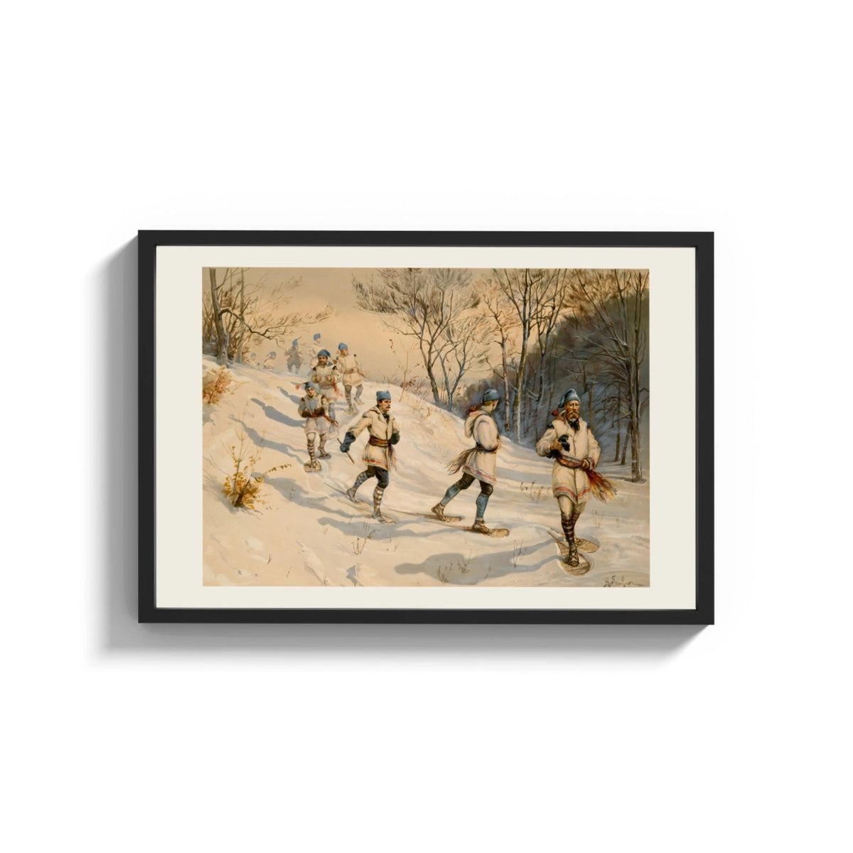 Framed Snowshoers in winter forest print shown as a wide statement piece on a clean white wall