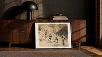 Snowshoers in winter forest print in a black frame leaning against a walnut sideboard