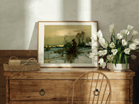 Winter landscape with bare trees print in an oak frame on a farmhouse dresser beside white tulips