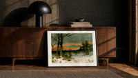 Woman walking through snowy winter landscape print in a black frame leaning against a walnut console in lamplight
