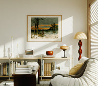 Woman walking through snowy winter landscape print in an oak frame above a mid-century book console with a vintage radio