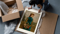 Victorian woman holding flower basket framed print being unpacked from protective bubble wrap and a box
