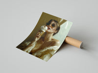 Hands unrolling a glam fashion print of a sunglasses-wearing woman in a fur coat against a neutral floor