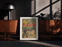 Black-framed man on horse at festival print on a moody console with designer coffee-table books