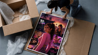 Woman in pink top fan art framed print being unpacked from protective bubble wrap and a box