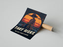 Luffy Take Risks Sunset One Piece anime poster print with orange sunset gradient next to shipping tube