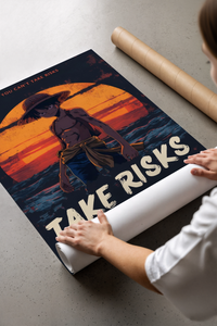 Hands unrolling the Luffy sunset art print over navy ocean waves on a concrete surface