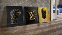 Louis Vuitton Pop Art Poster Set three-piece set leaning on parquet beside a vintage loft door