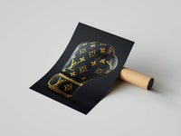 Gold and dark brown LV monogram boxing glove shown as a rolled print on a grey surface