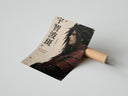 Rolled Anime warrior in red armor poster beside its crush-resistant kraft shipping tube