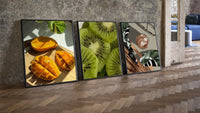 Mango, Kiwi and Coffee Set of 3 leaning on parquet beside a vintage loft door