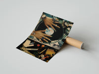 Gently curled Manicured Hands on a Vinyl Record print beside its protective shipping tube
