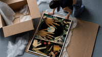 Manicured Hands on a Vinyl Record framed print being unpacked from protective bubble wrap and a box