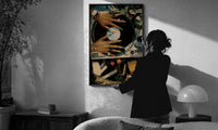 Manicured Hands on a Vinyl Record print in a slim black frame being hung on a sunlit wall in a monochrome room