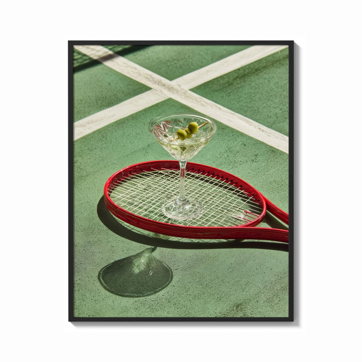 Framed Racket and Martini print shown as a bold statement piece on a clean gallery wall