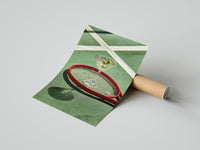 Gently curled Racket and Martini print beside its protective shipping tube