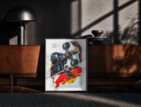 Black-framed F1 driver celebrating beside race car print on a moody console with designer coffee-table books